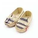 20251118_1018_Baby Shoes on Display_remix_01kab0m0mre38vm85zv4v5qtpw.webp