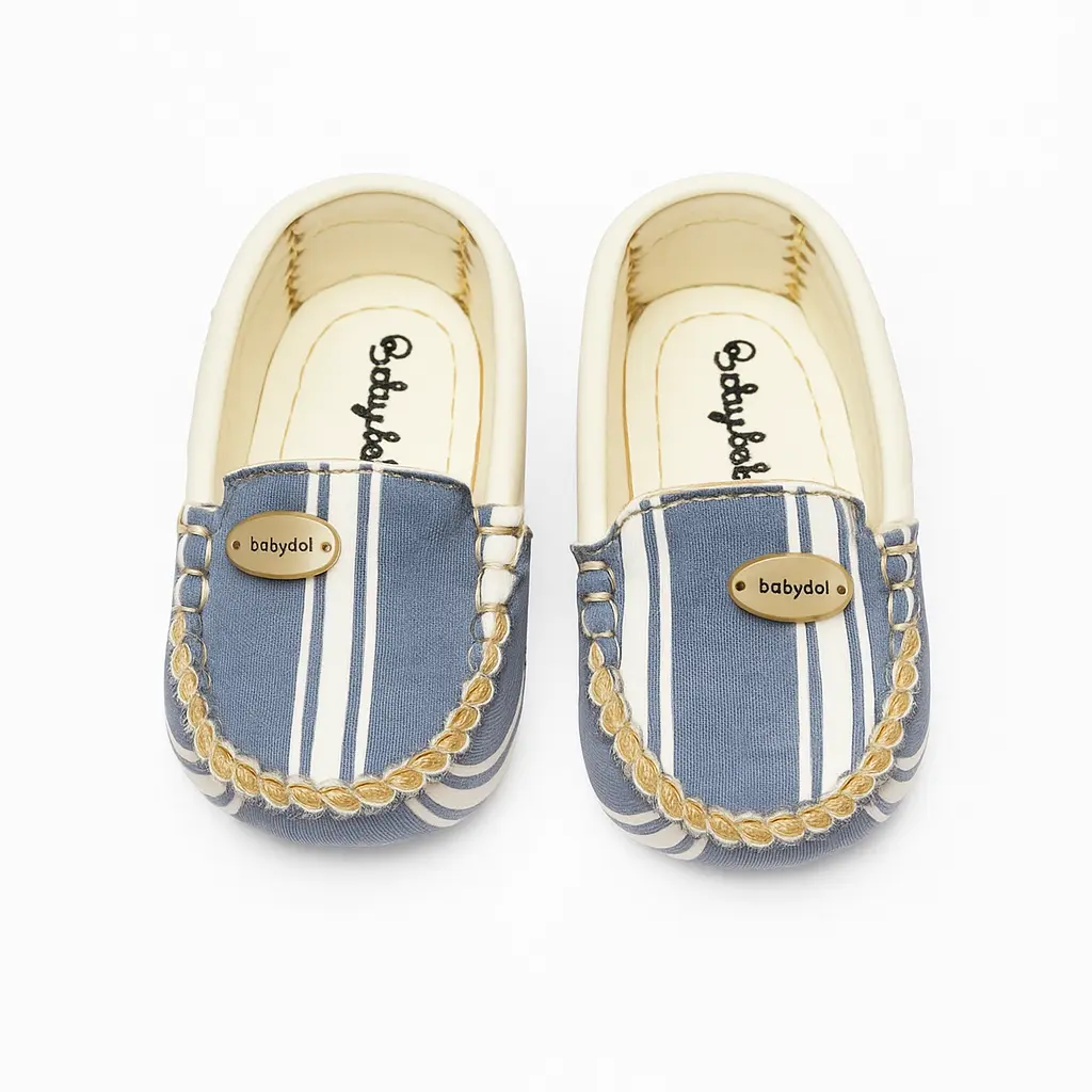 20251118_1021_Baby Shoes Studio Display_remix_01kab0rxr9fyct57eb11h28y33.webp