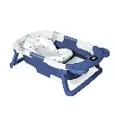 bathtub with pillow and shower sponge